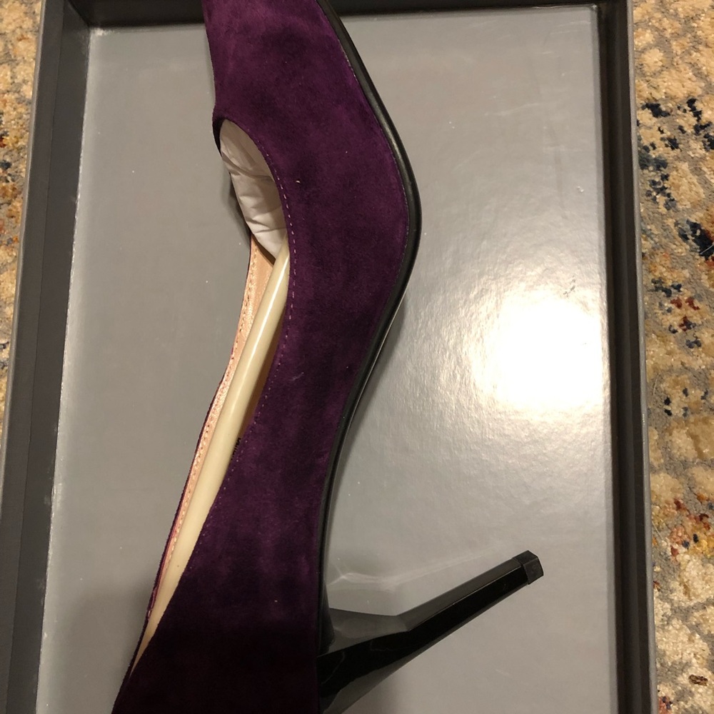 Lola cruz size 37(6 /1/2) plum colored with chrome color heel brand new in box